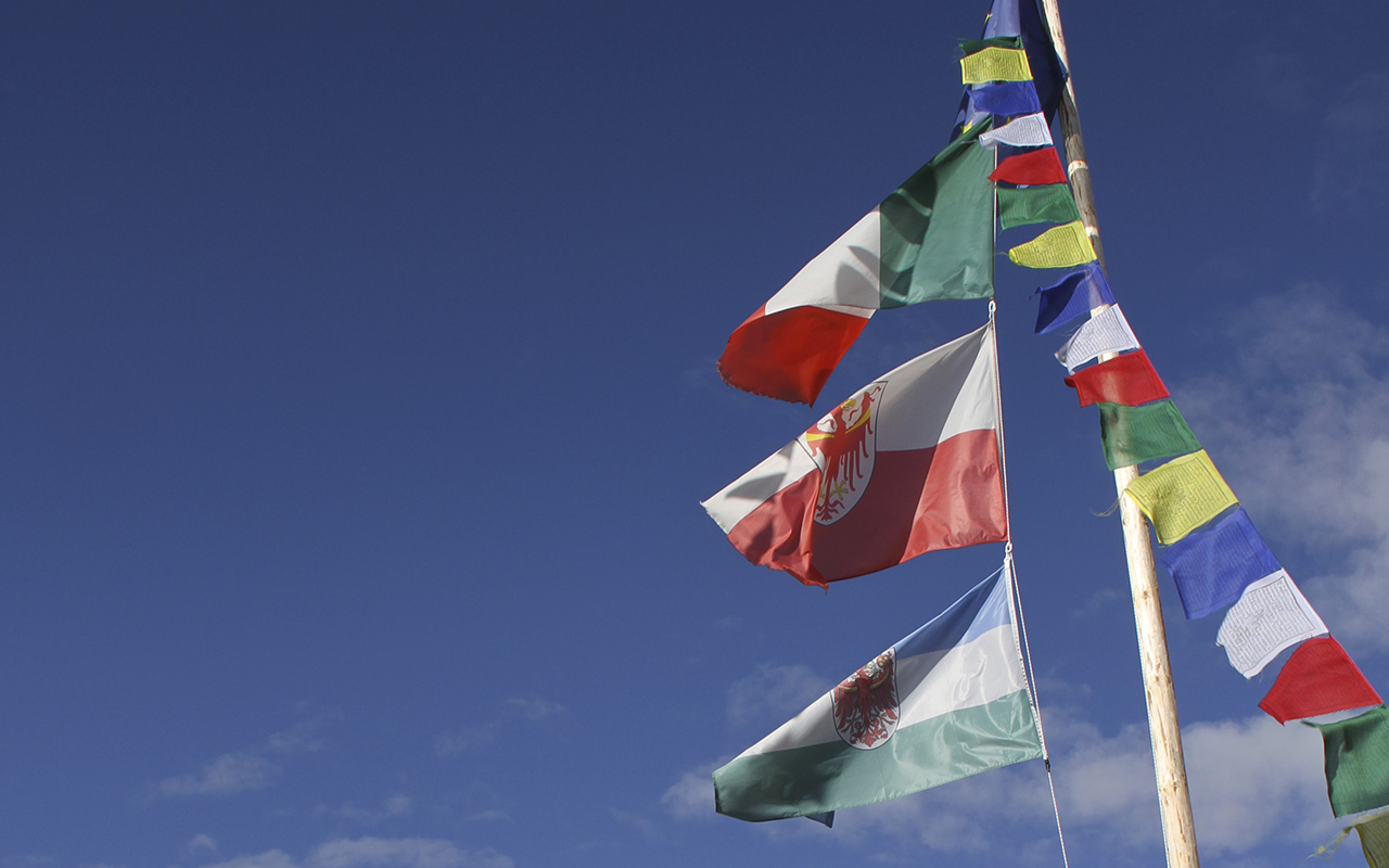 Detail of the Italian, South Tyrolean and Ladin flags
