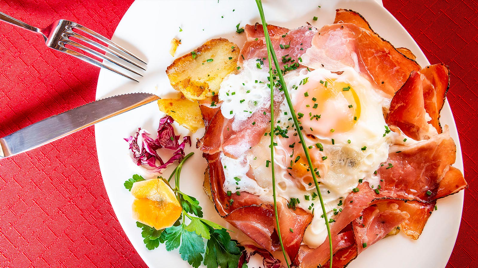 Detail of a plate of speck and eggs at the Fanes Hut